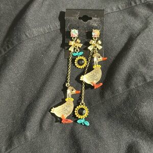 Betsey Johnson mismatch goose Farmhouse earrings.